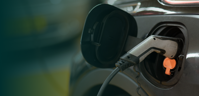 An electric vehicle plugged in.